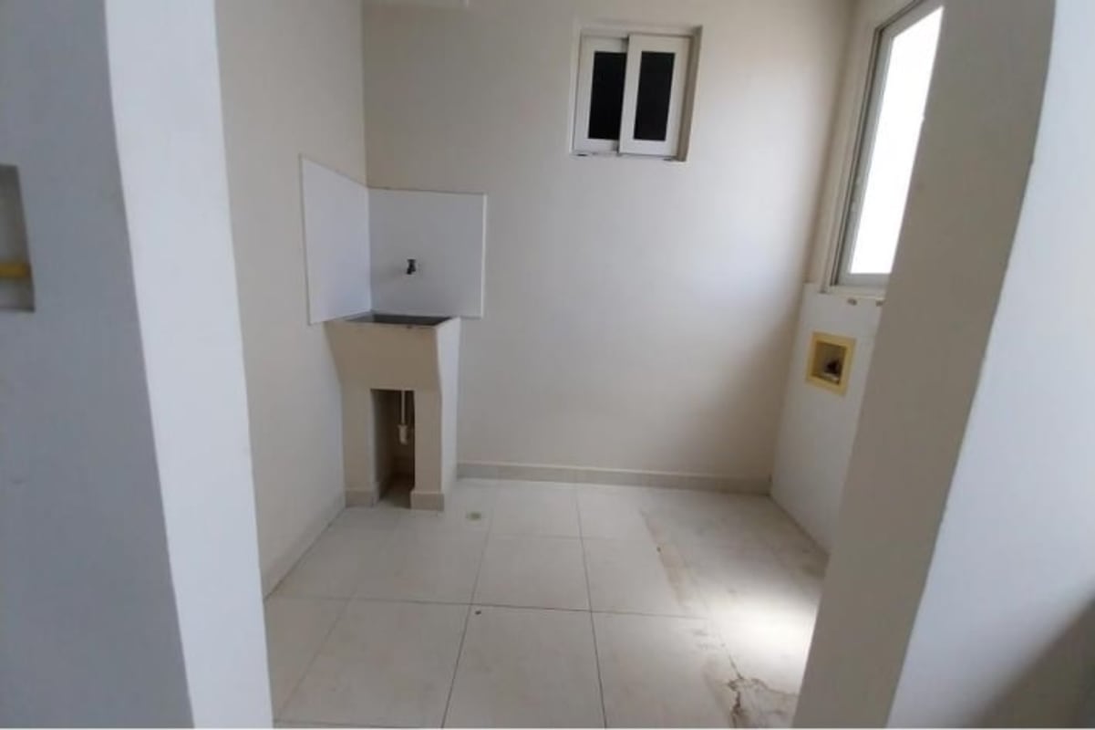 Bright bedroom fitted for AC with closet and natural light in Panama apartment for sale