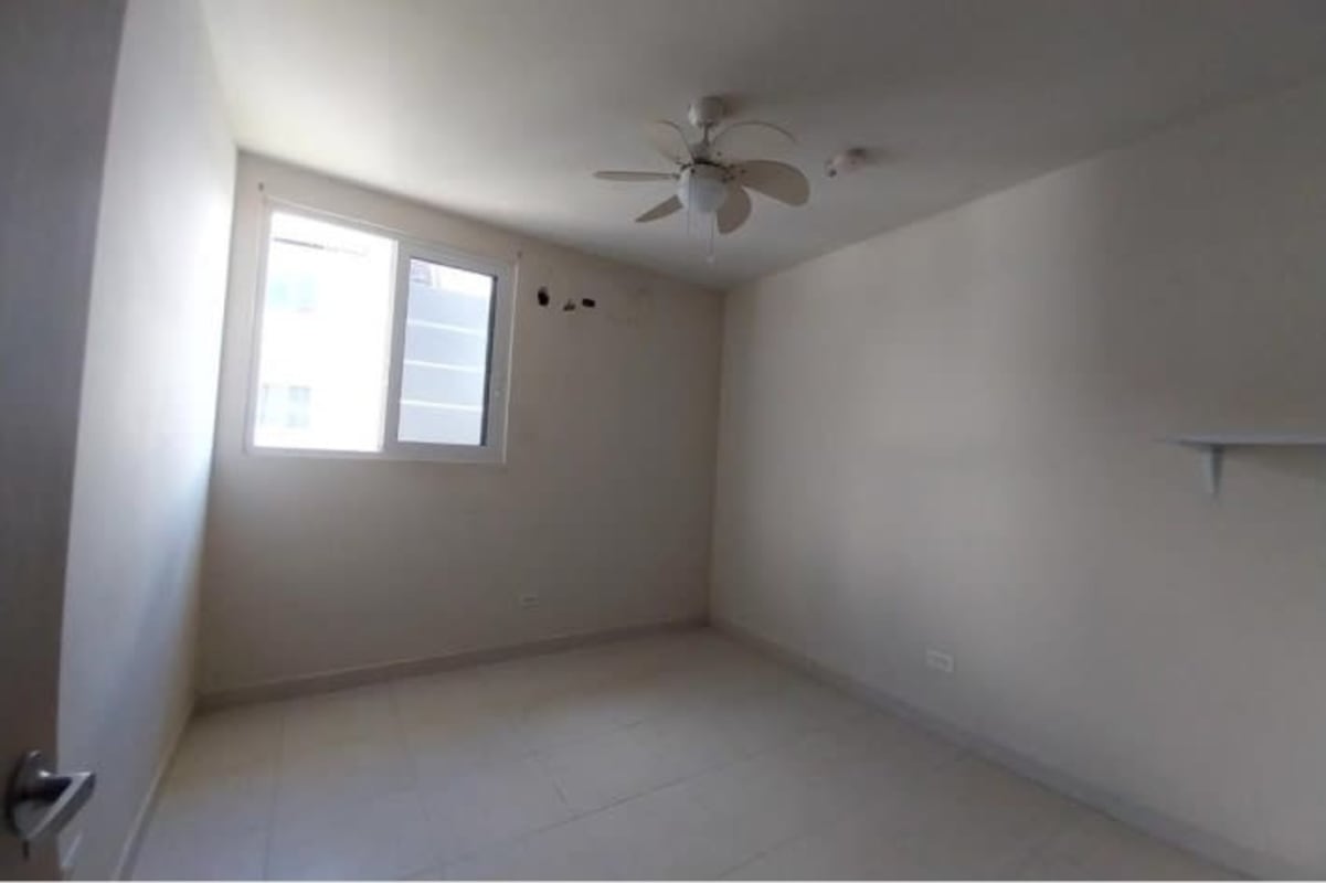 Bright third bedroom with large window in Panama apartment