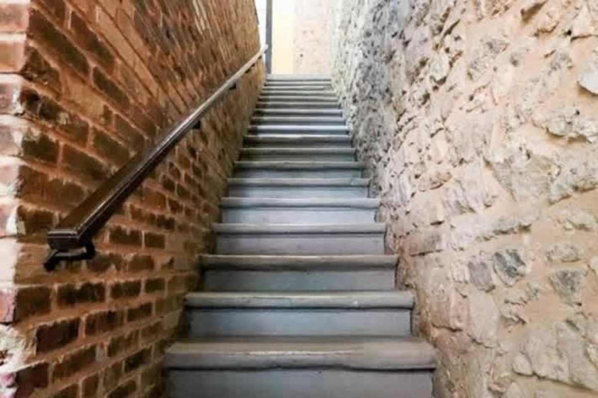Empty industrial interior with metal supports and doorway Casco Viejo Panama