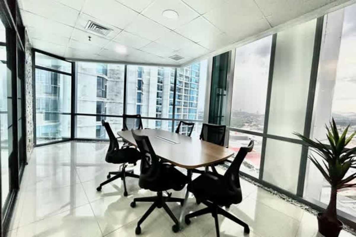 Corporate conference room glass walls and city views in PH Costanera Costa del Este Panama