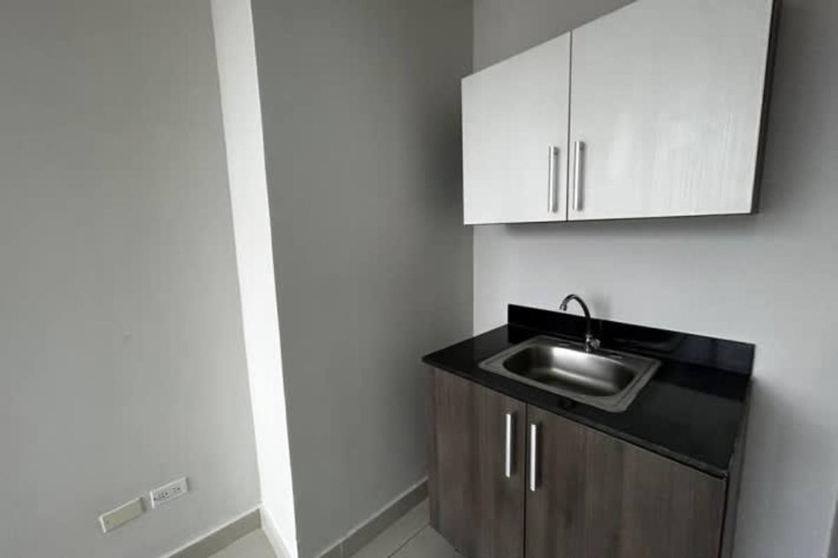 Office kitchenette with granite countertop, stainless steel sink and cabinets PH Costanera Panama