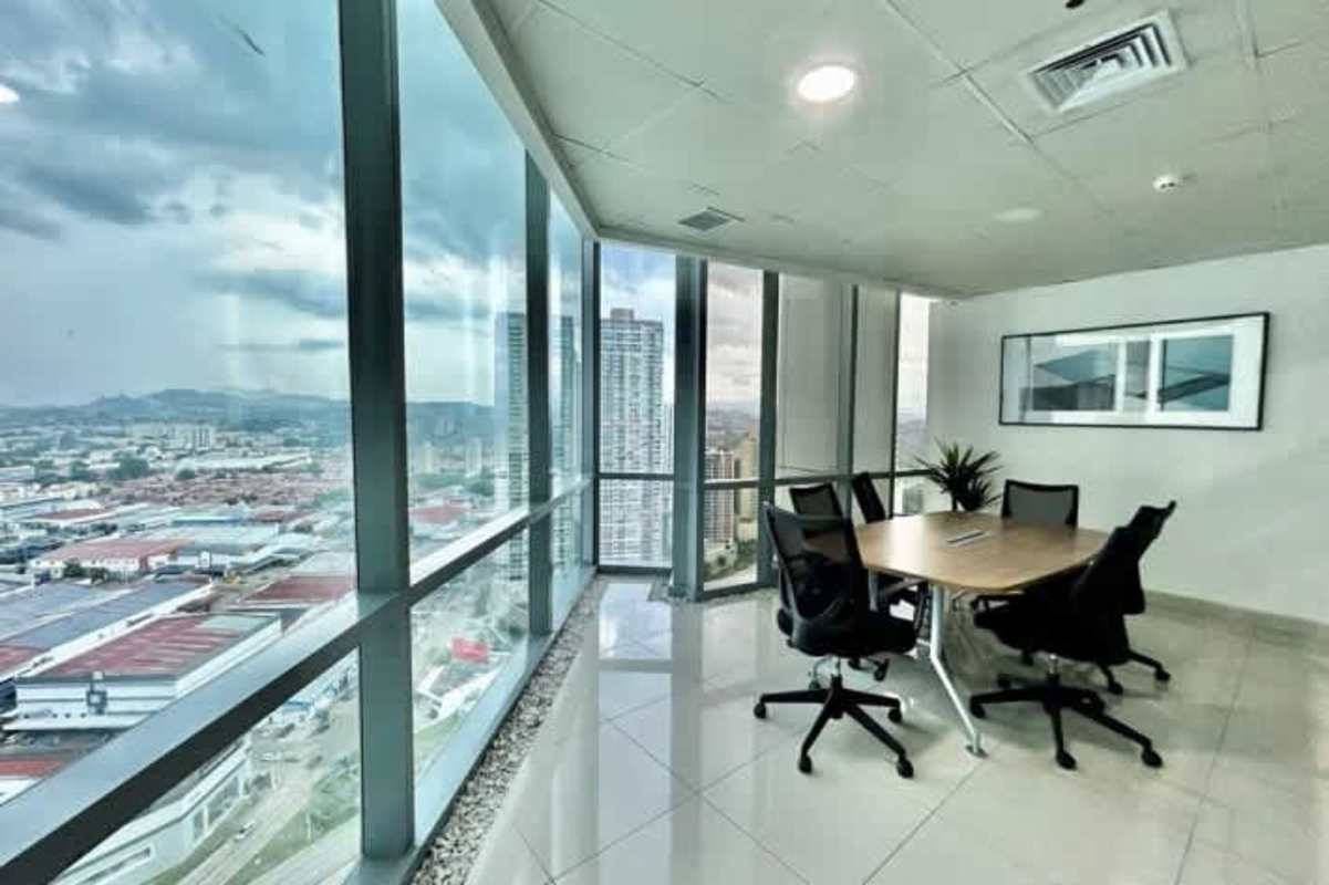 Interior glass-walled offices inside PH Costanera Costa del Este furnished commercial space