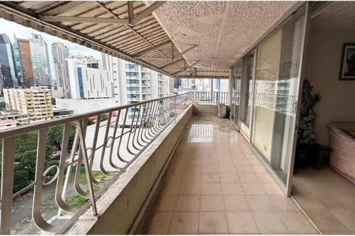 Covered balcony overlooking skyline from PH Mont Royale penthouse Panama