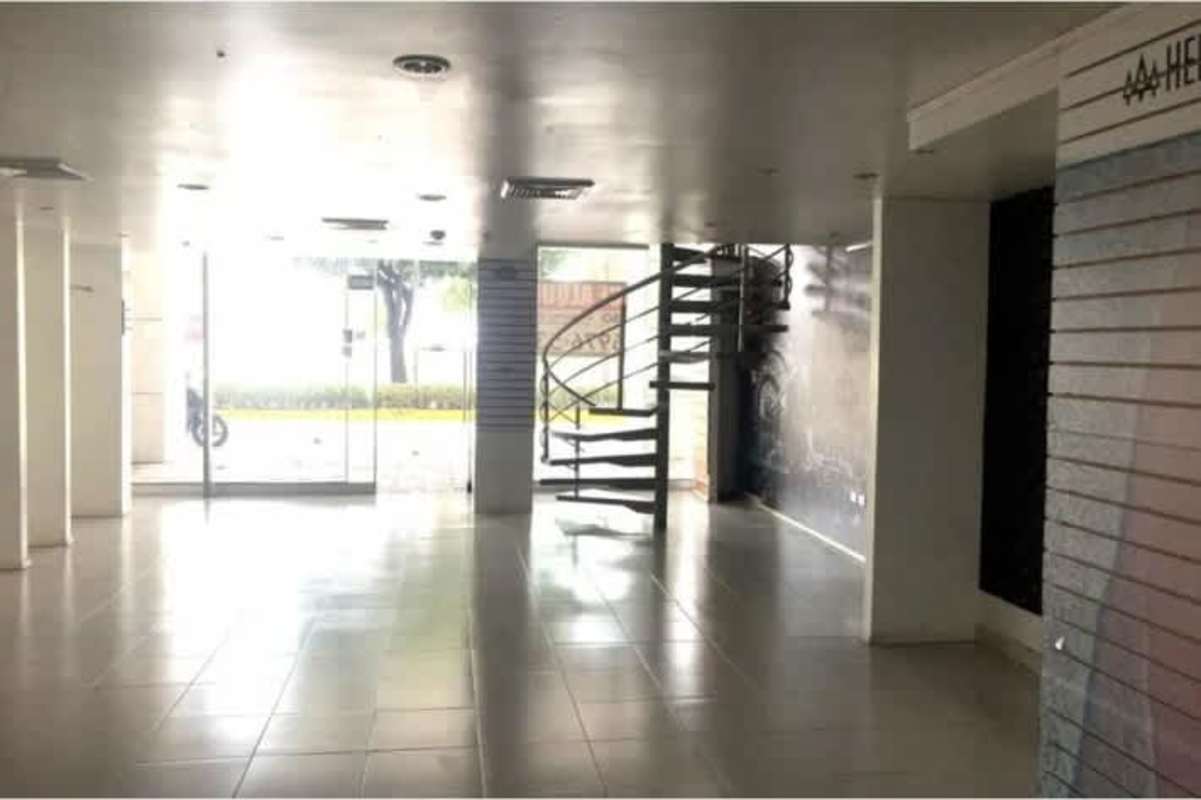 Retail double-level commercial shop interior with spiral staircase PH H2O Panama City