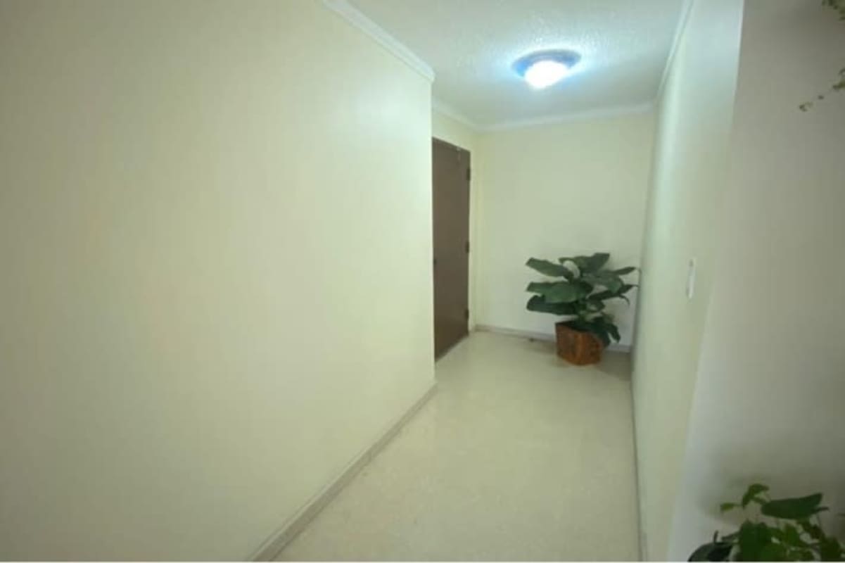 Large dining area with big windows, chandelier lighting, air conditioning in apartment Obarrio Panama