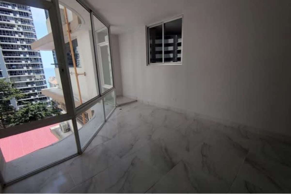 Bedroom with marble floors, closet, split AC unit in PH Paitilla Tower Punta Paitilla Panama
