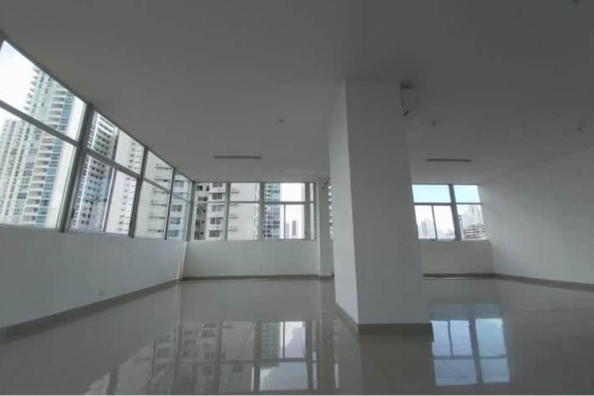 Spacious living room with sliding glass doors to balcony city ocean views PH Firenze Tower San Francisco Panama