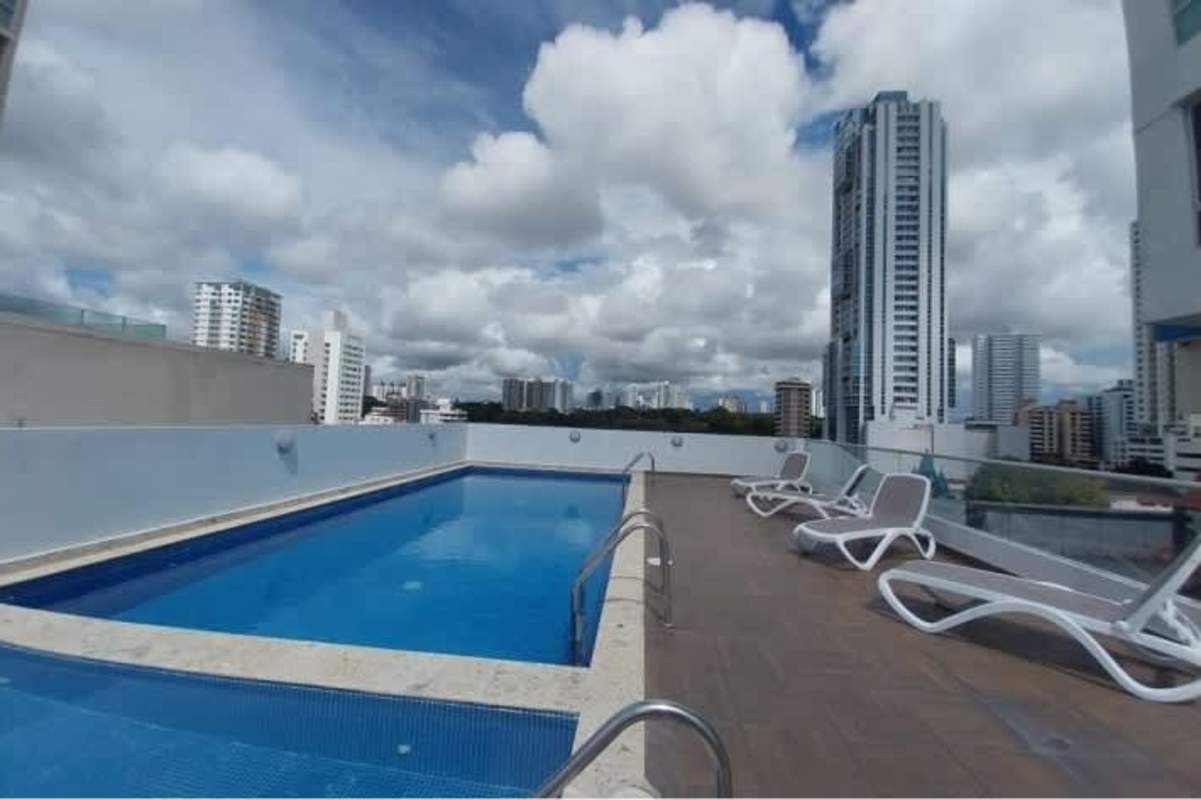 Colorful rooftop playground with city skyline views at PH Firenze Tower Panama
