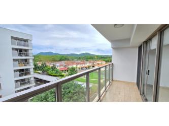 Covered balcony overlooking green mountains PH Woodlands Panama Pacifico
