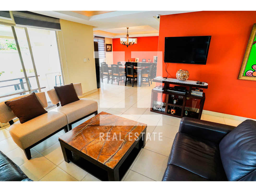 Work space with window blinds, sofa, tile floor in Paseo Dorado home for sale