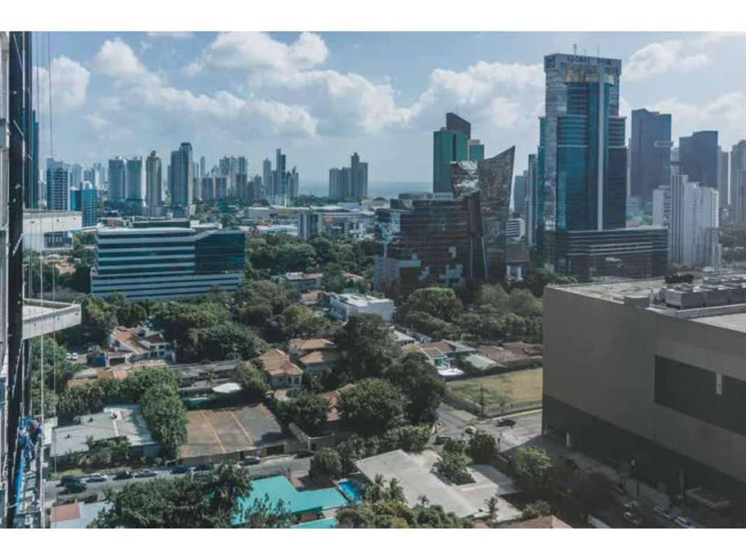 Panoramic skyline with skyscrapers, residential towers, and window washers on PH BICSA Tower Panama