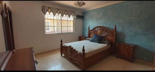 Granite countertops kitchen with island wood cabinets stainless appliances Albader III home