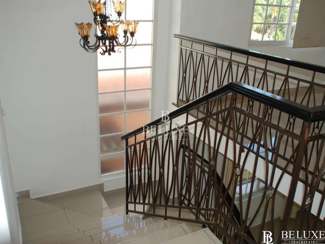 Modern kitchen with granite countertops, breakfast nook, appliances in Villa Valencia Costa Sur Panama