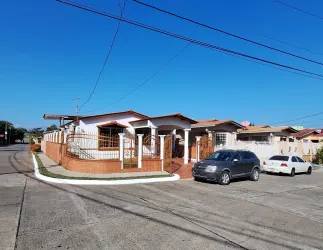 Front facade traditional house with wooden awning over window Vacamonte Panama