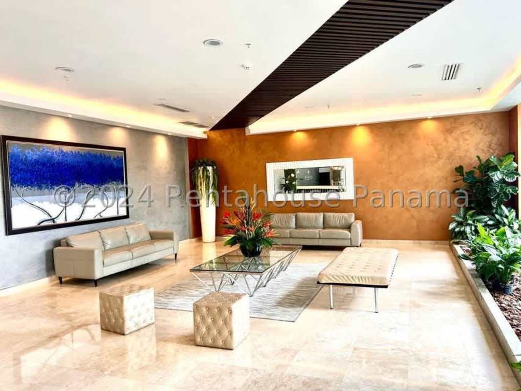 Modern kitchen with granite counters and stainless steel appliances at PH Costa del Este Panama