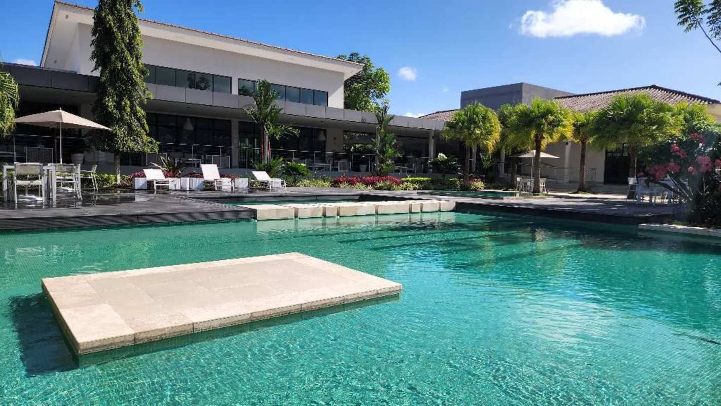 Small soccer court with artificial grass and net fencing inside PH Sierra Nevada Brisas del Golf Panama