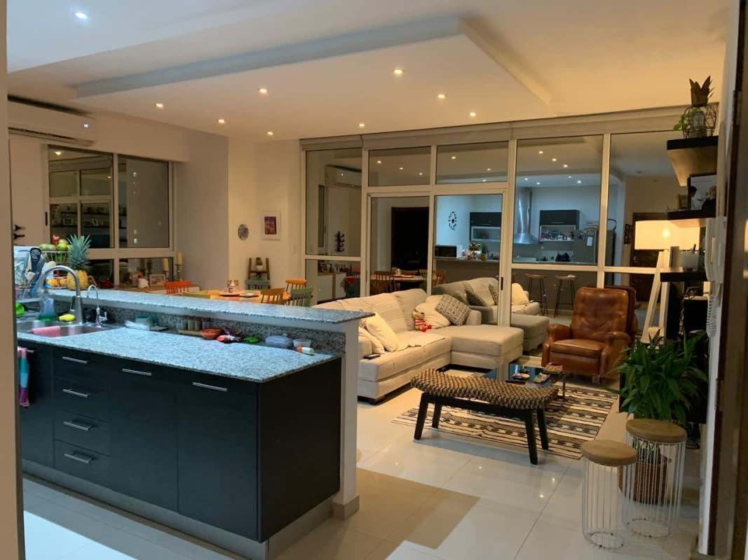 Modern open kitchen with granite countertops at PH Quadrat, San Francisco Panama