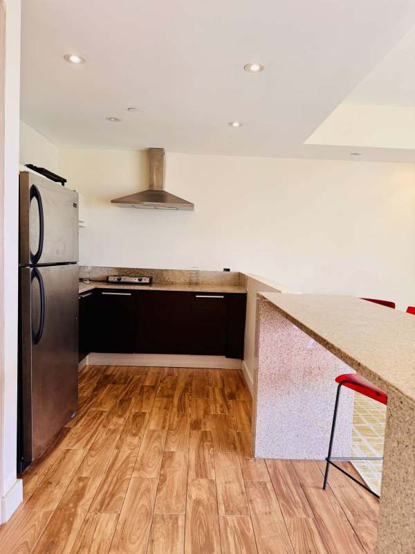 Luxury infinity pool with skyline views at Waldorf Astoria Panama Marbella