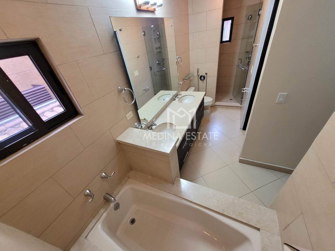 Bright furnished open living dining area with balcony access in Embassy Club Clayton Panama