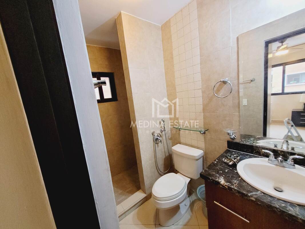 Master bedroom with private balcony, walk-in closet, king bed, AC at Embassy Club Panama