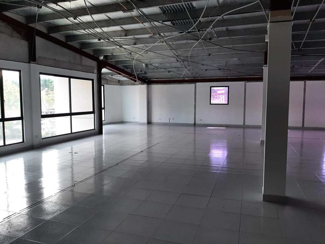 Parking space and front facade of commercial showroom warehouse in Albrook Panama City
