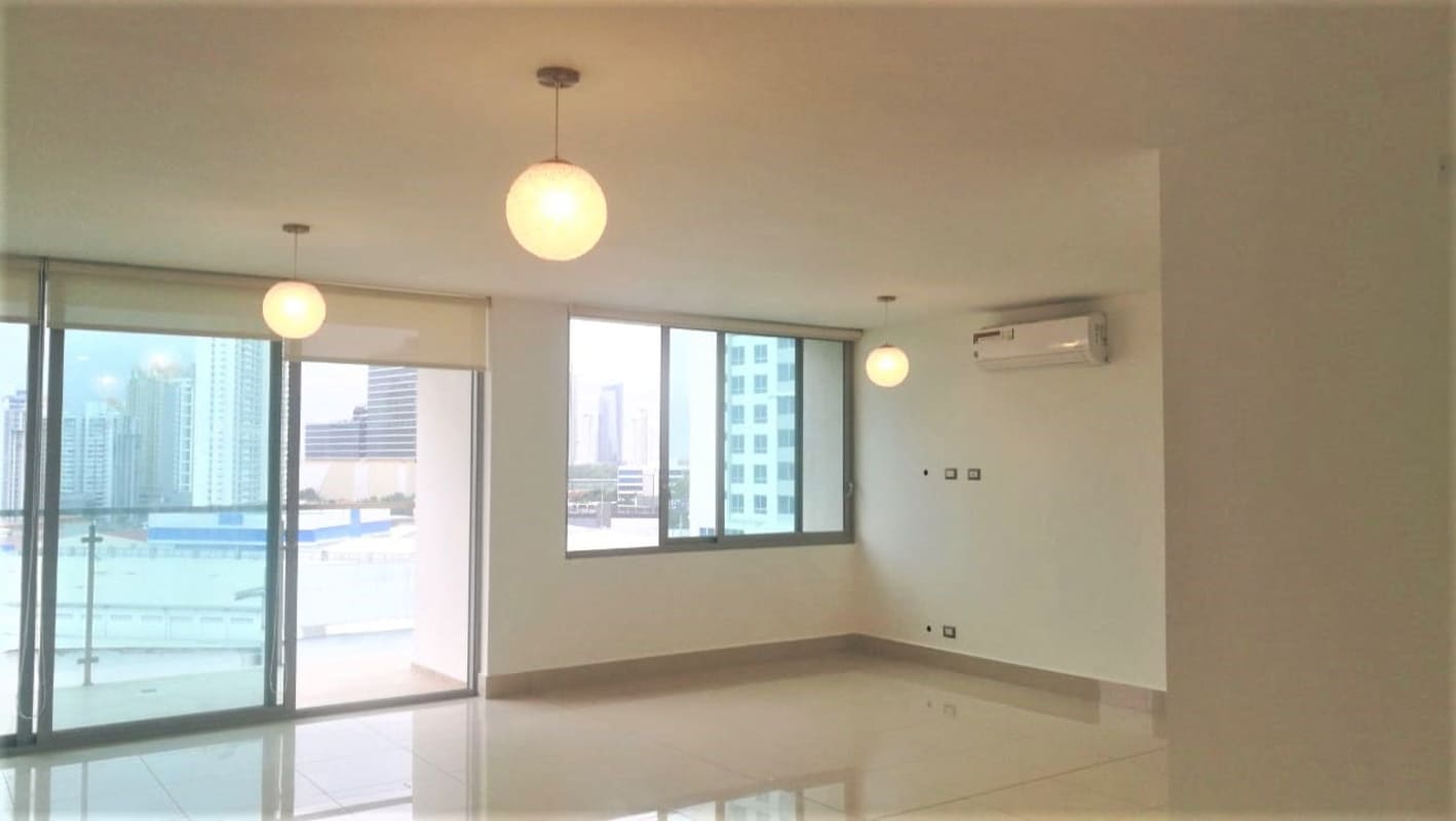 Modern kitchen with white cabinets, granite counters and built-in appliances Costa del Este Panama