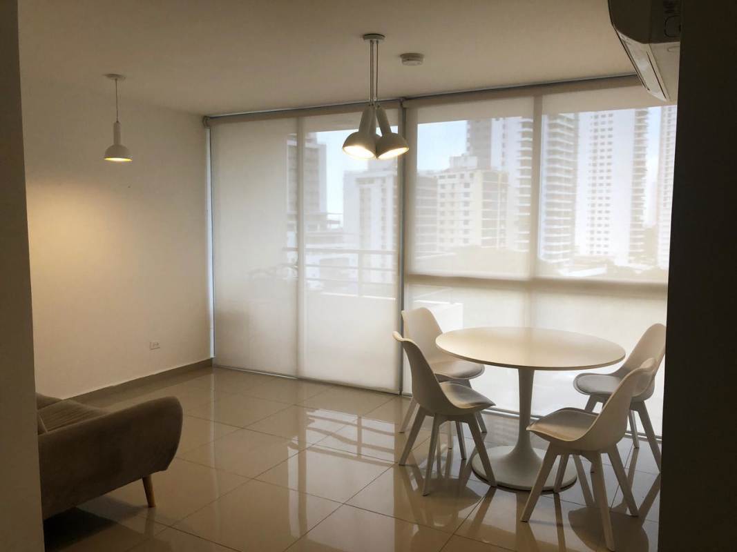 Spacious living and dining room with floor-to-ceiling windows and balcony PH Sky Park Carrasquilla