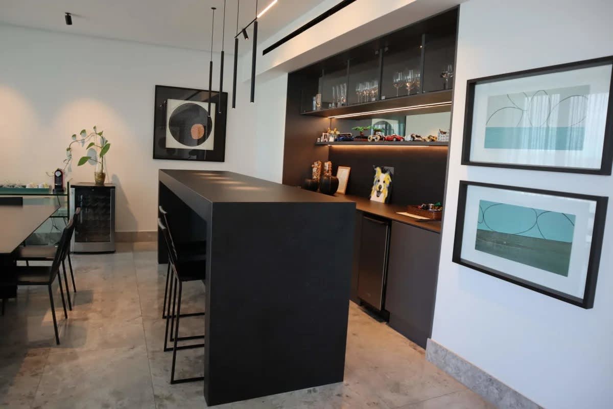 Luxury kitchen with marble finishes, integrated appliances at Empire Santa María apartment