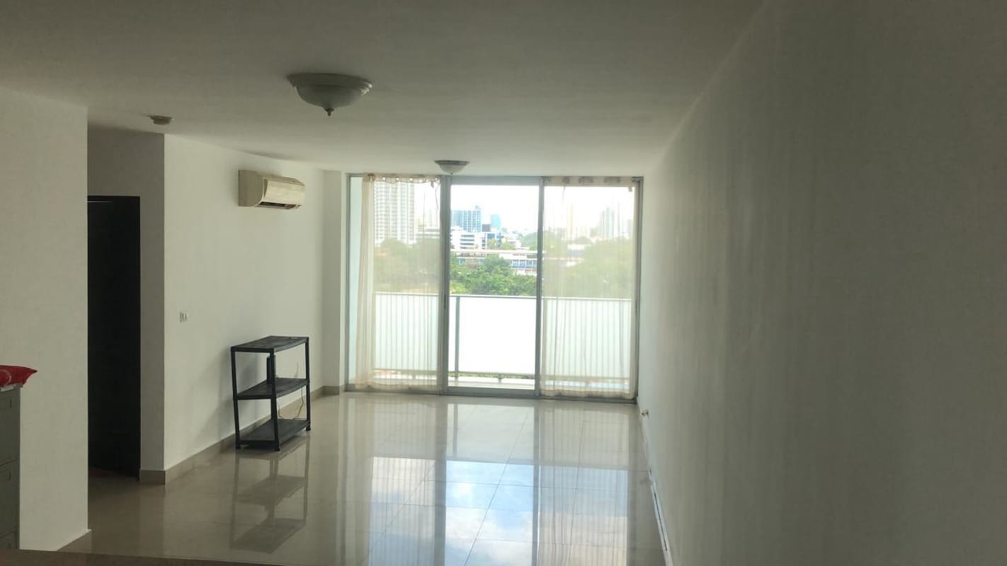Open living dining with balcony access and city views in PH Oceanaire Punta Pacifica Panama