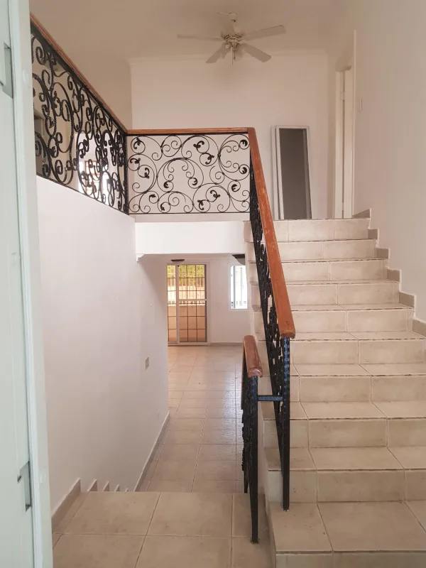 Kitchen interior with ample cabinetry and double sink Villa de las Fuentes Panama