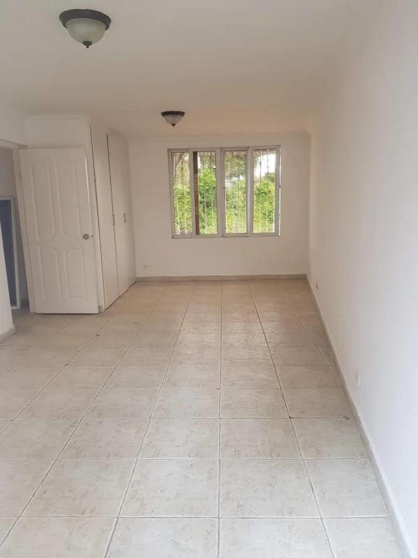 Minimalist bright living room with garden view in PH Torres de Toscana Panama