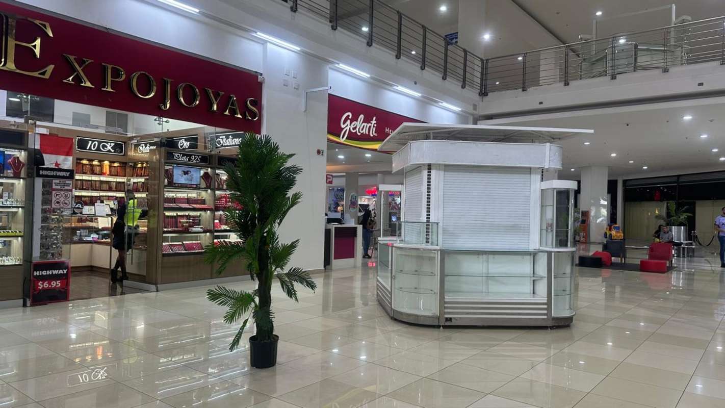 Modern shopping center atrium multiple floors skylight colorful design Los Andes Mall Panama