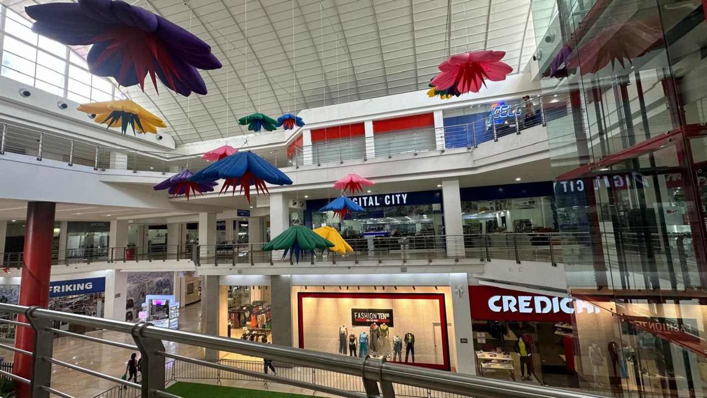 Modern mall food court colorful seats skylight design Los Andes Mall Rufina Alfaro Panama City