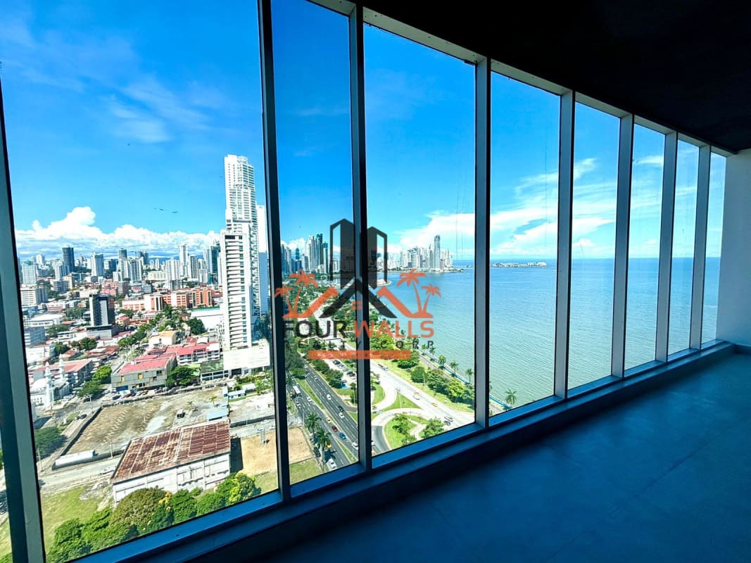 Aerial view of modern Panama City skyline with Avenida Balboa front and coastal line by Torre Interplus