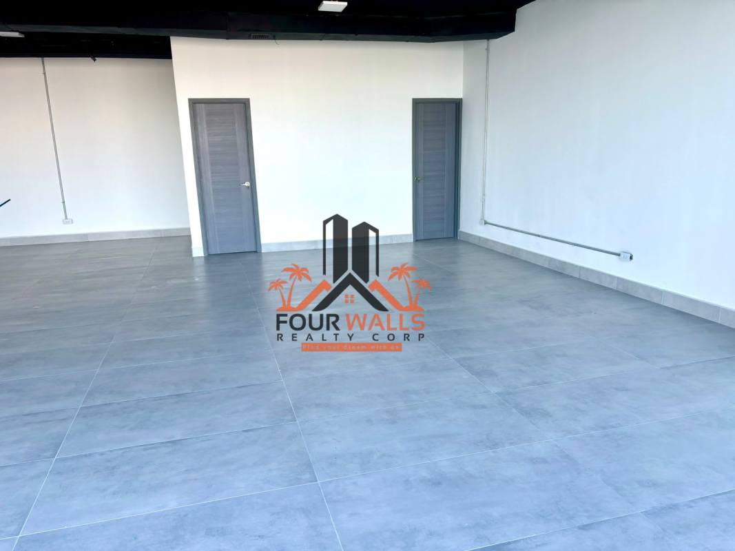Commercial space with modern finishes and floor-to-ceiling windows Panama City view