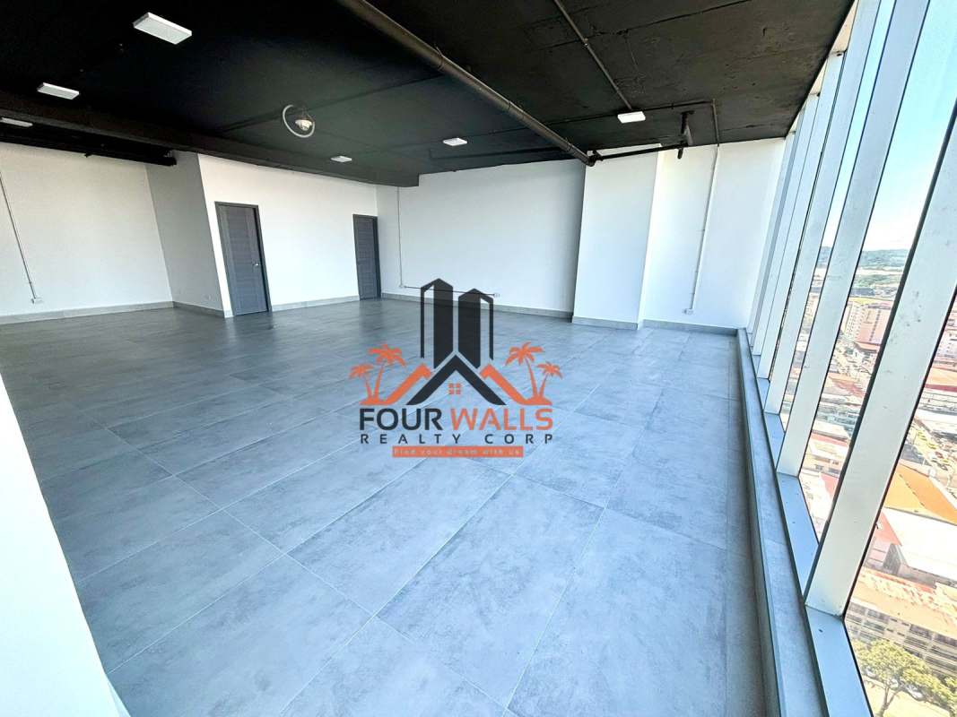 Minimalist grey tile wall bathroom with modern fixtures in commercial space Torre Interplus Panama