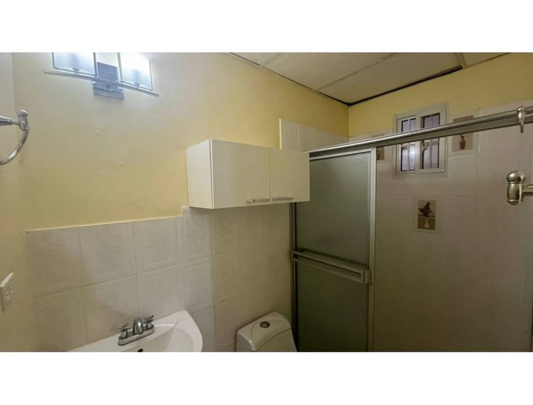 Hallway cream walls tile floor built-in cabinet Camino Real Panama