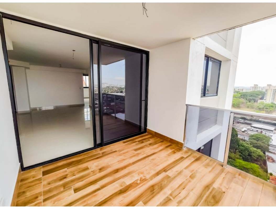 Balcony with sliding glass doors and glass railing PH Carreras El Cangrejo city view