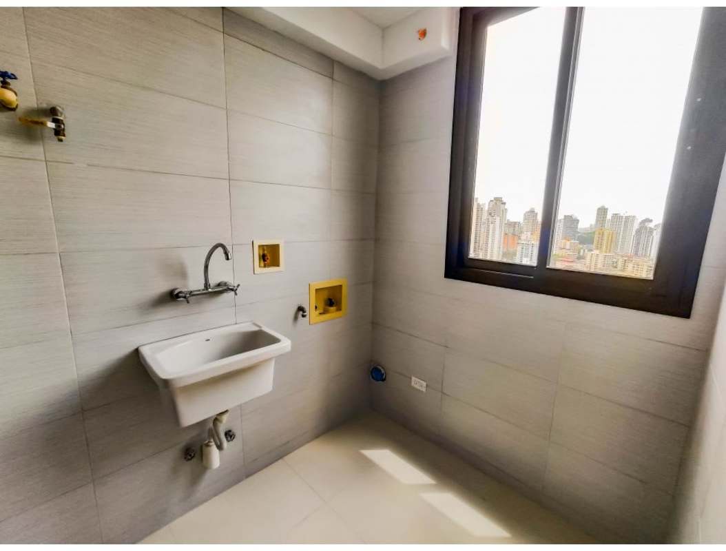 Laundry area with sink and window with city view, PH Carreras El Cangrejo Panama