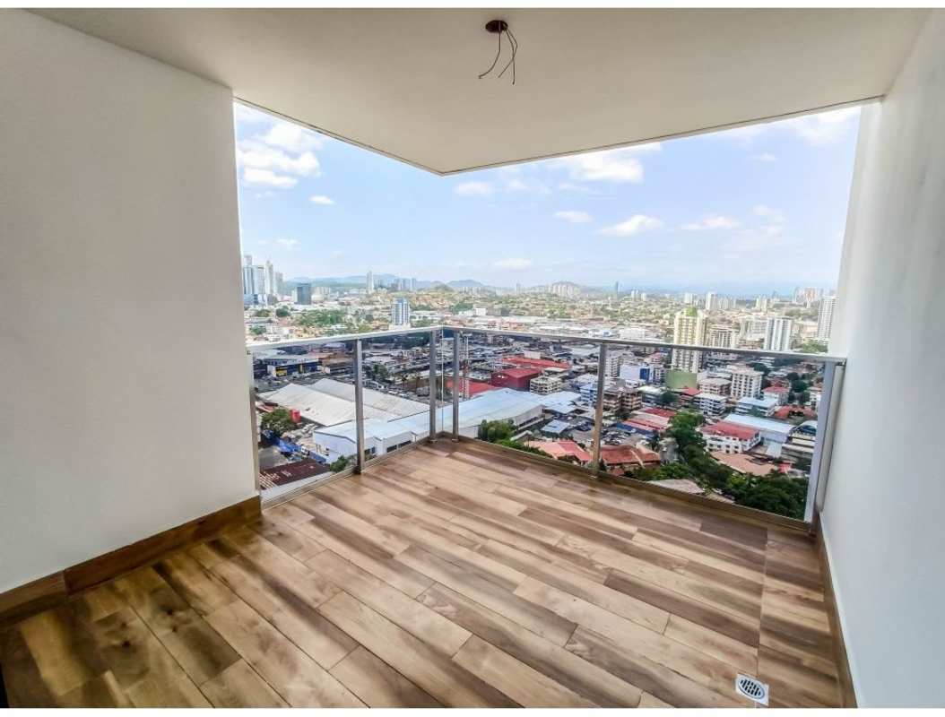 Large balcony with glass railing overlooking Panama City, PH Carreras El Cangrejo