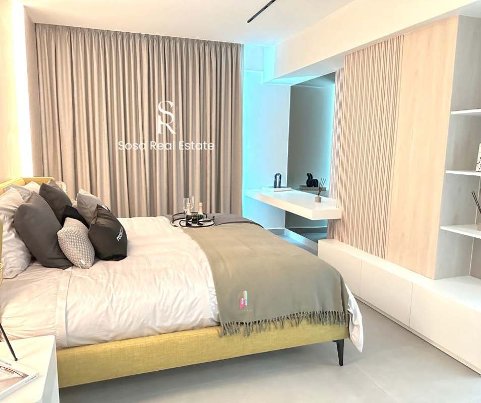 Fully furnished upscale bedroom with queen bed views and modern design at Uptown Condo Suites Panama City