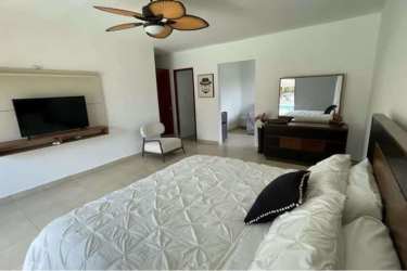 Spacious bedroom ensuite bathroom AC ceiling fan Casa Nia Punta Barco Panama