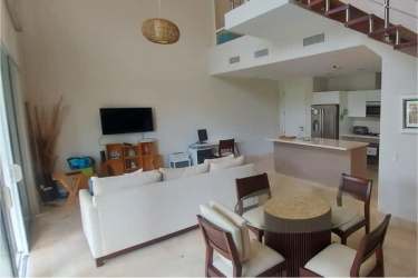 Minimalist bathroom with glass shower dark cabinets tile PH Puntarena Buenaventura Panama