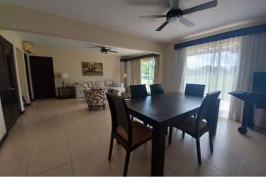 Bright living dining room furnished open-plan villa in Decameron Golf Beach Villas Panama