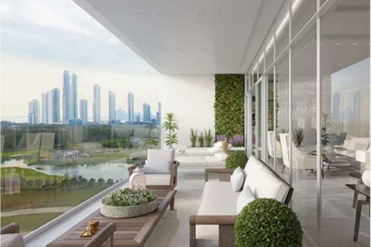 Grand lobby with chandelier and elegant lounge area in Empire Residences Santa María Panama