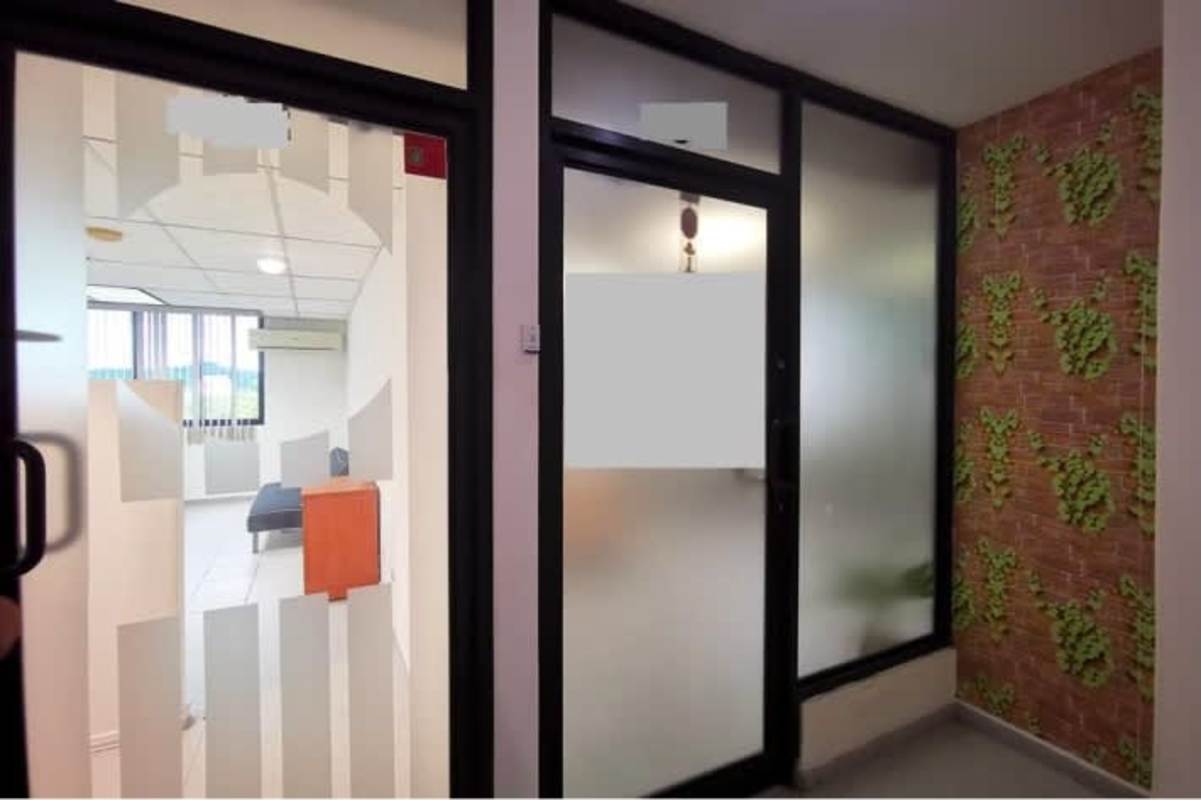 Interior image with glass doors, reception visible, modern design in El Cangrejo Panama City