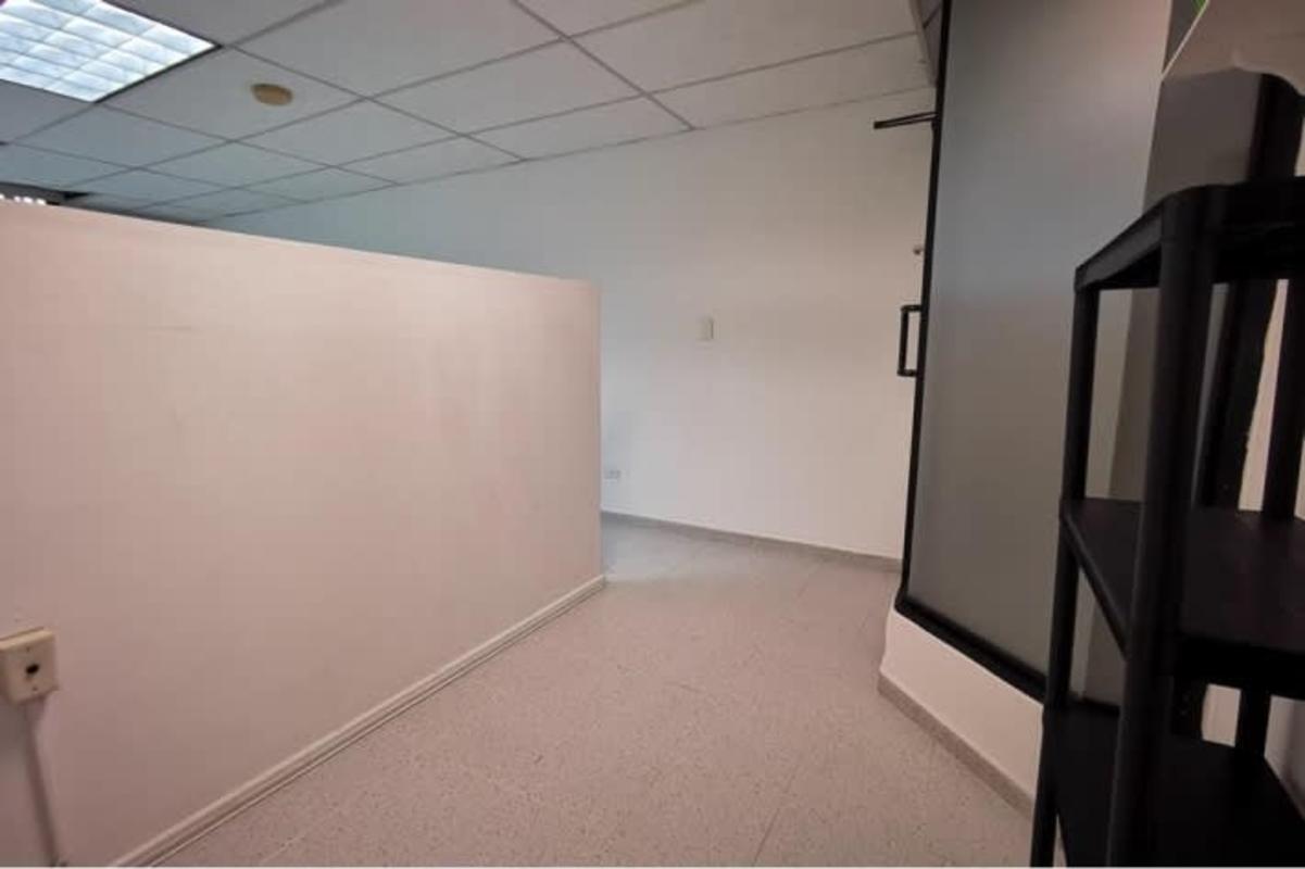 Office corridor with partitions, frosted glass, shelving International Business Center El Cangrejo