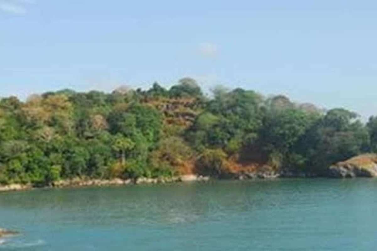 Aerial view of calm secluded bay beach on private island Panama