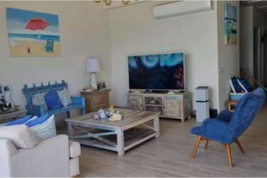 Fully furnished living room with ocean view terrace Playa Caracol Panama
