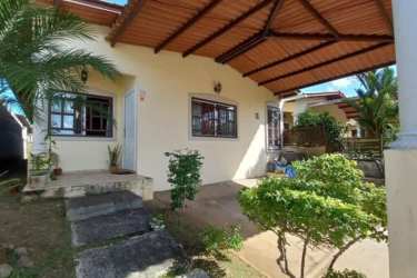 Modern open kitchen granite countertop pass-through dining area single family house Vista Alegre Panama Oeste